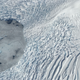 The calving from of a glacier. Photo: NASA